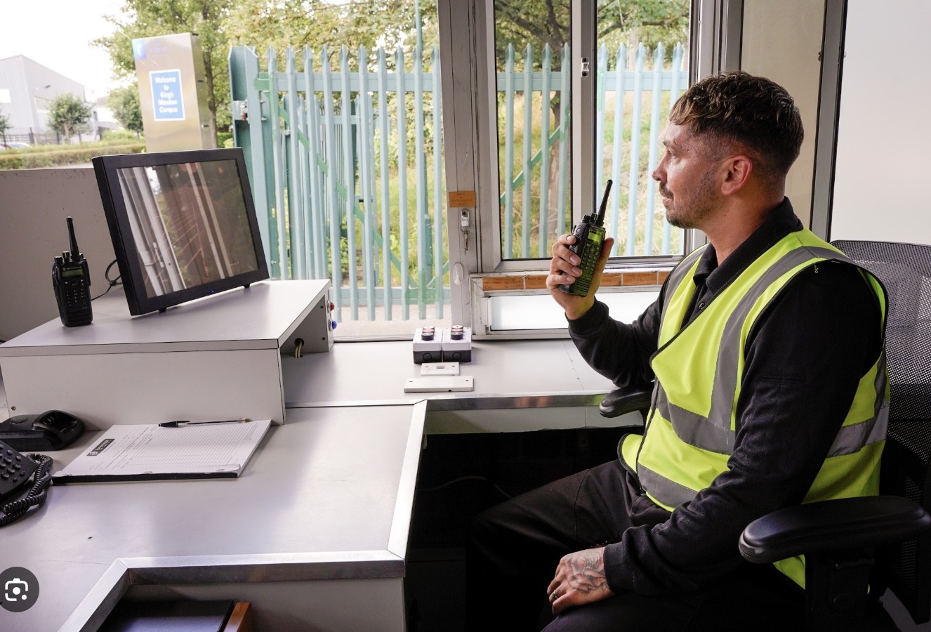 Security guard using a radio